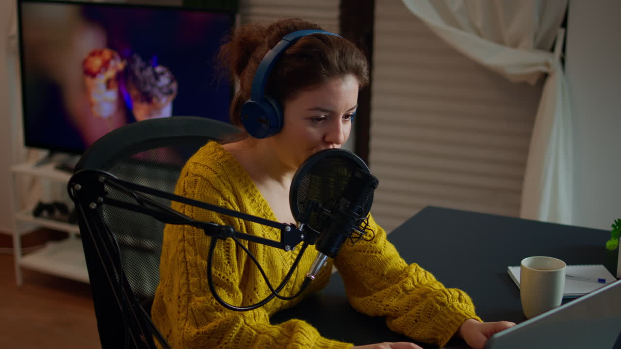 Blogger speaking at microphone with followers