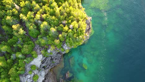 Descending-On-Eroded-Rock-Cliffs-In-Georgian-Bay-Islands-National-Park,-Ontario,-Canada