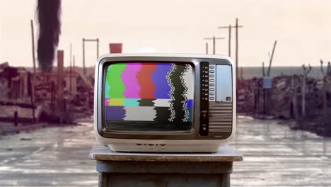 old television set with exploding green screen on a street of a ruined city. 4k resolution.