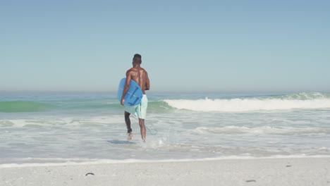 african american man ready to go surf