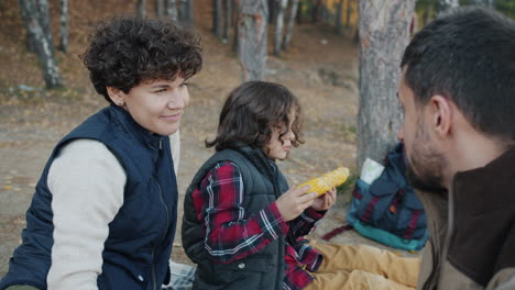 family picnic in the autumn forest