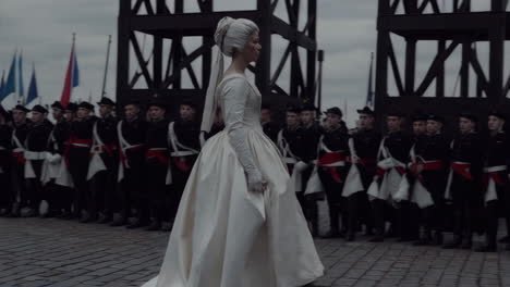 historical figure in formal attire with military presence