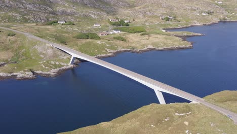 aerial shot of the bridge connecting the isle of scalpay to the isle of harris on the outer hebrides of scotland