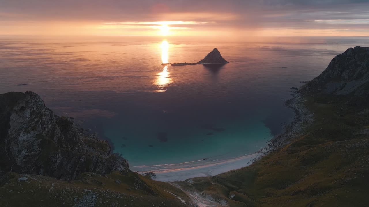 Norwegian spectacular nature landscape view, drone flyover And&oslash;ya island capturing coastal M&aring;tind mountains cape at sunset golden hours