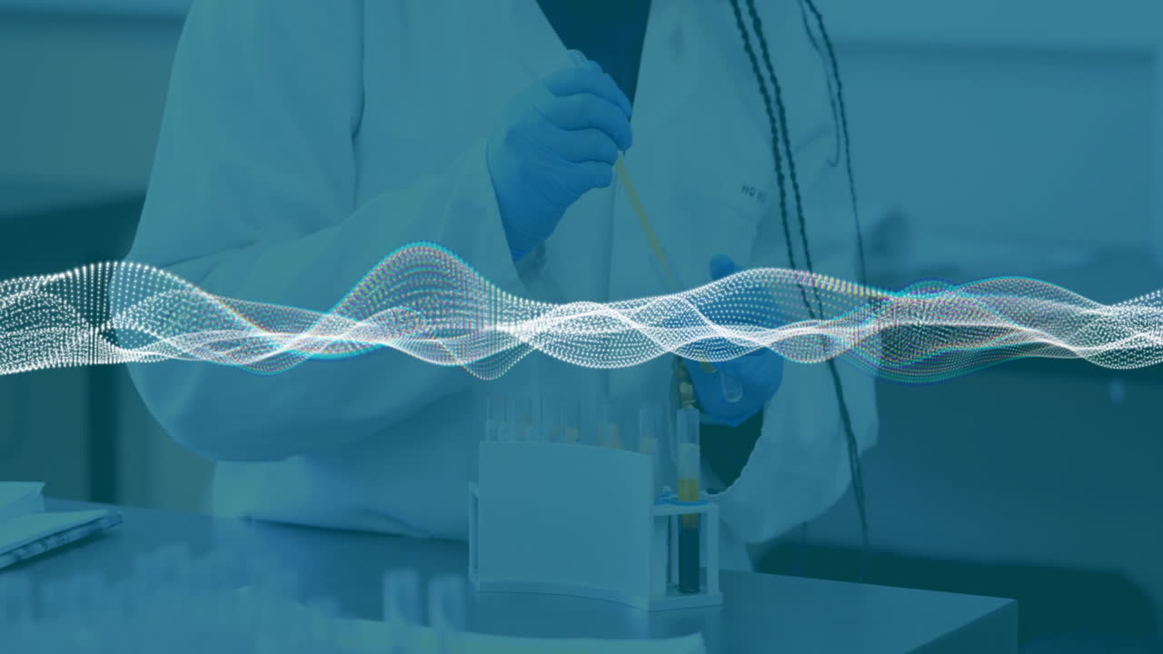 Scientist pipetting yellow liquid into test tubes on shiny metal bench under wave data overlay