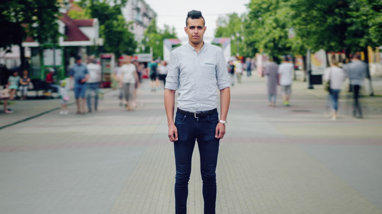 Man Standing on City Street