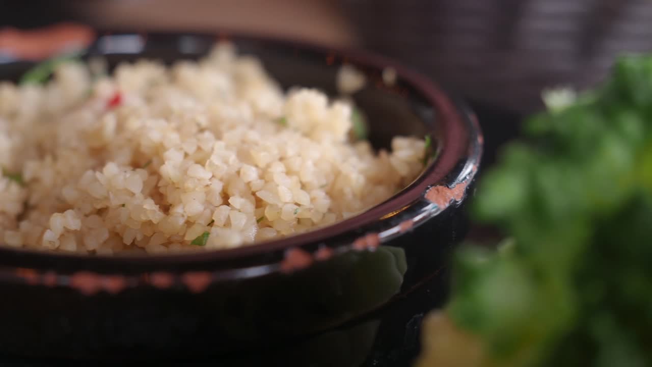 Close-up of a bowl of couscous or quinoa