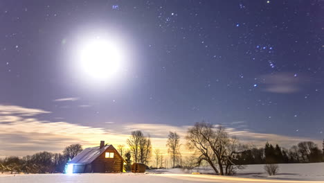 wooden hut in the cold winter landscape moon in the sky