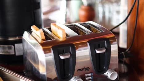 toasted bread popping out of a toaster