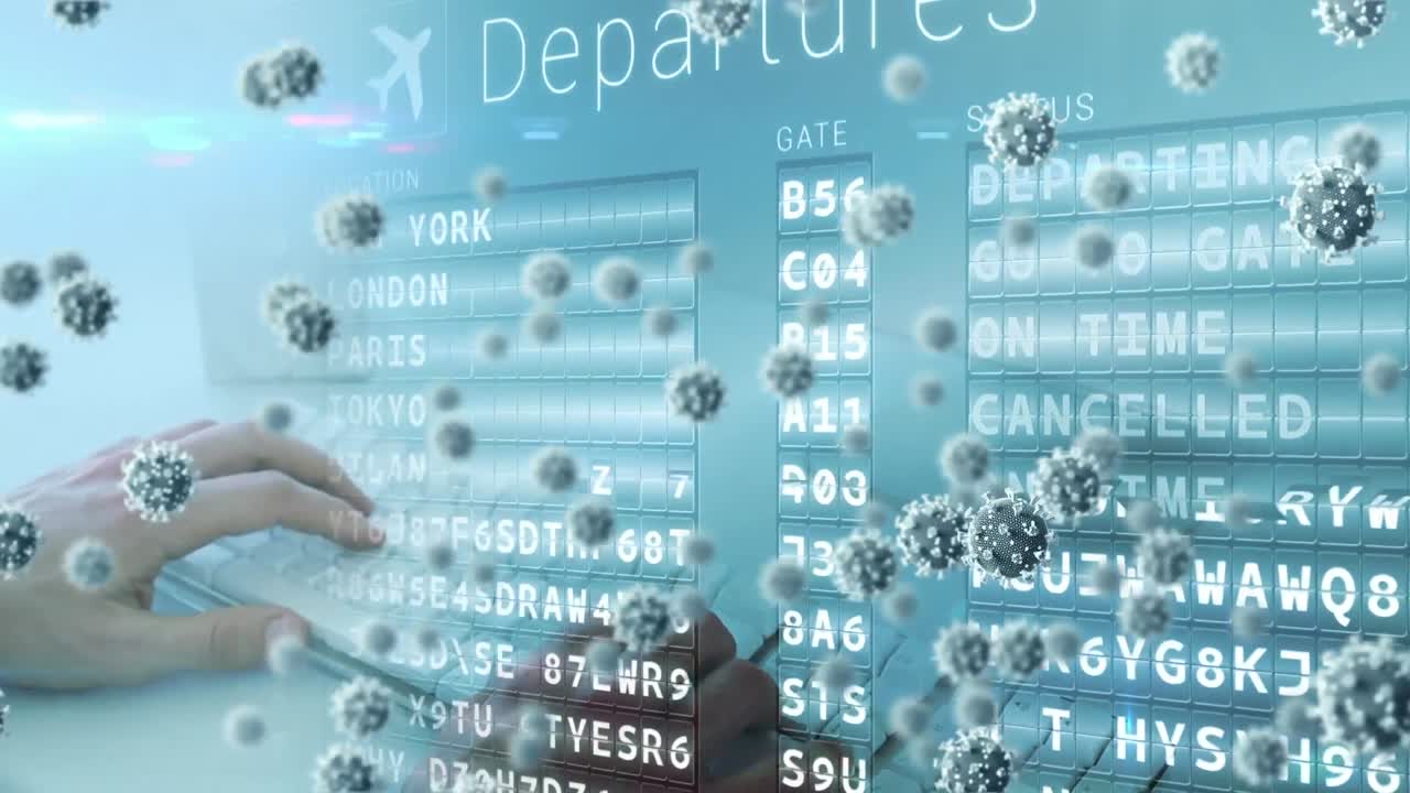 Animation of macro Covid-19 cells floating with airport time schedule over a person typing