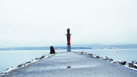 statue at the end of jetty