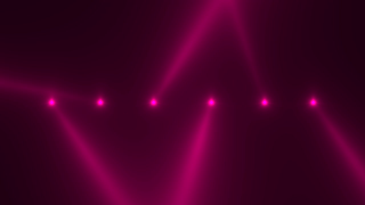 Premium stock video - Red glowing spotlight beams on black gradient stage