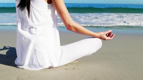 rear view of woman performing yoga