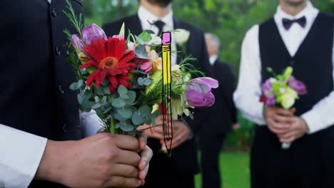 Animation-of-pencil-over-married-caucasian-couple-with-flowers