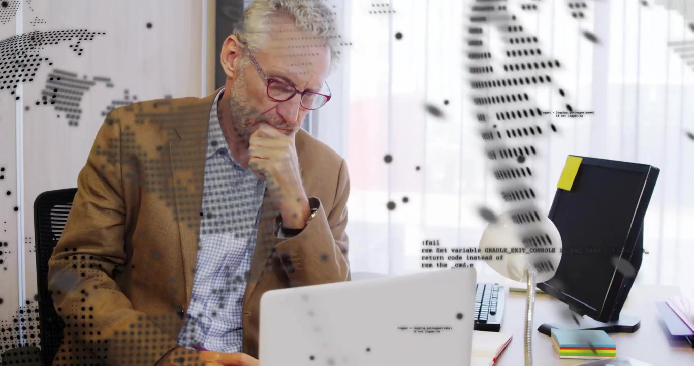 Man shifting to typing and writing at laptop as dot-globe overlay sweeping across for business