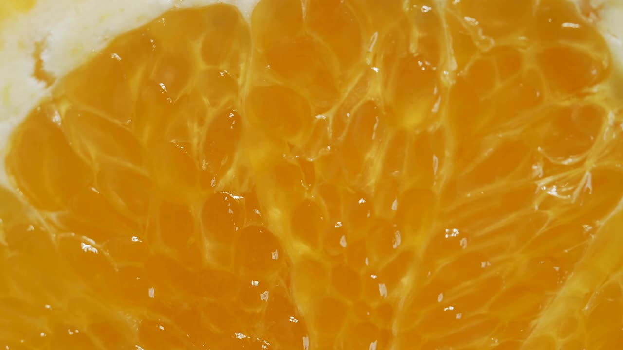 Fette d'arancia rotanti