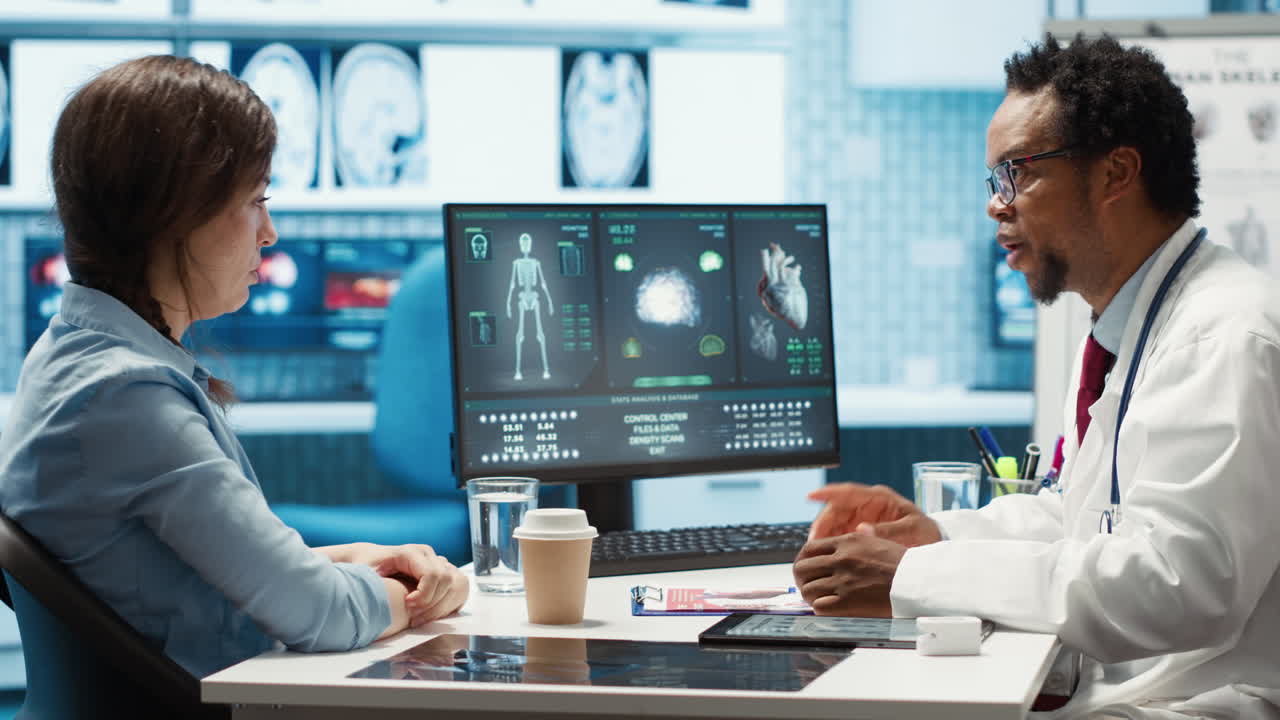 Doctor reading x ray imaging for a diagnostic report at consultation