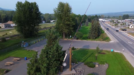 Giant-Fishing-Rod-at-Houston's-Visitor-Info-Centre-Along-a-Busy-Highway-in-British-Columbia,-Canada