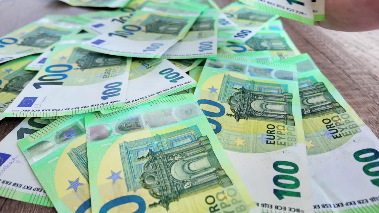 Man's Hand Takes From Pile Euro Money Lying On Table Few Banknotes 4k