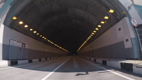 driving through a tunnel at night