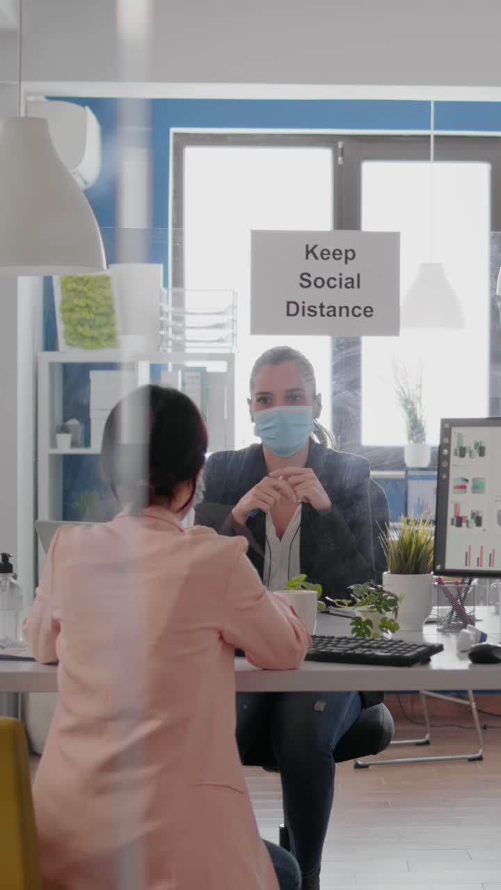 Office meeting with social distancing measures