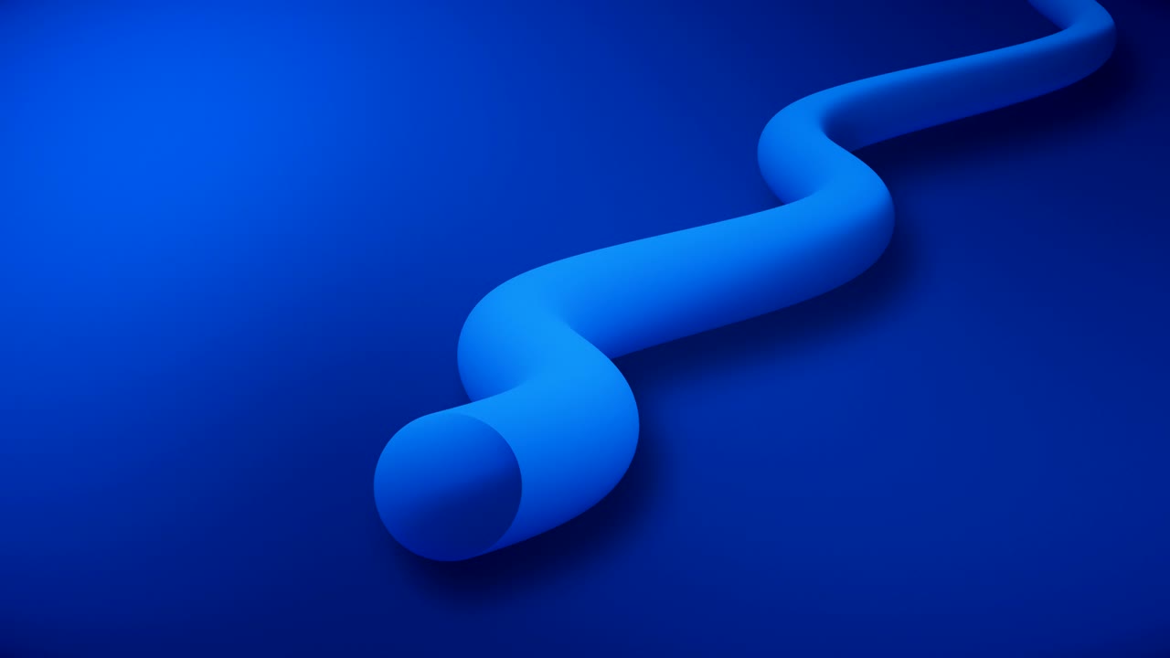 The plastic pipe moves on the floor crawling like a snake.