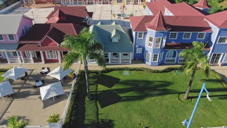 row of bright pastel-hued houses in samana, dominican republic