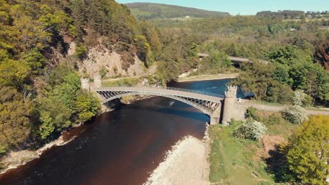 thomas telfords craigellachie bridge over the river spey in scotland