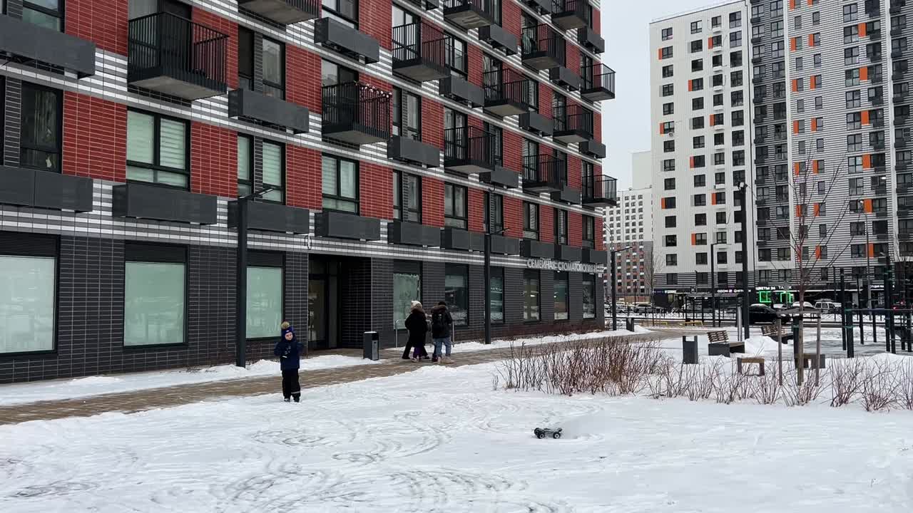 Winter scene with buildings and people