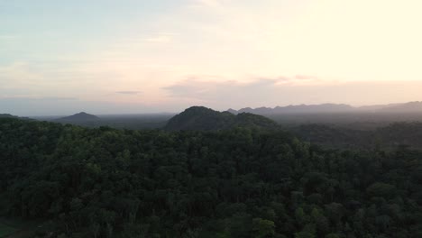 Jungle-Mountain-Sunset-Parallax-Aerial-Shot-4K