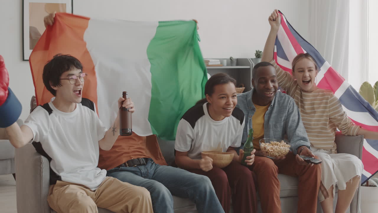 Fans with Flags Watching Sports on TV