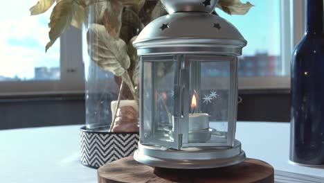 elegant candle lantern decor at a window