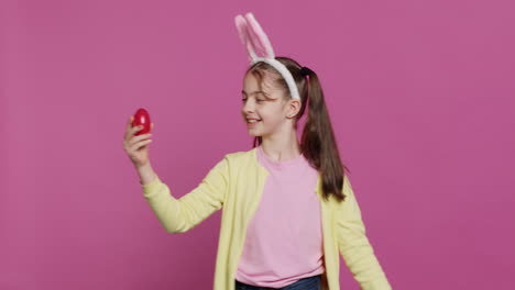 enthusiastic small child spinning around in front of camera,