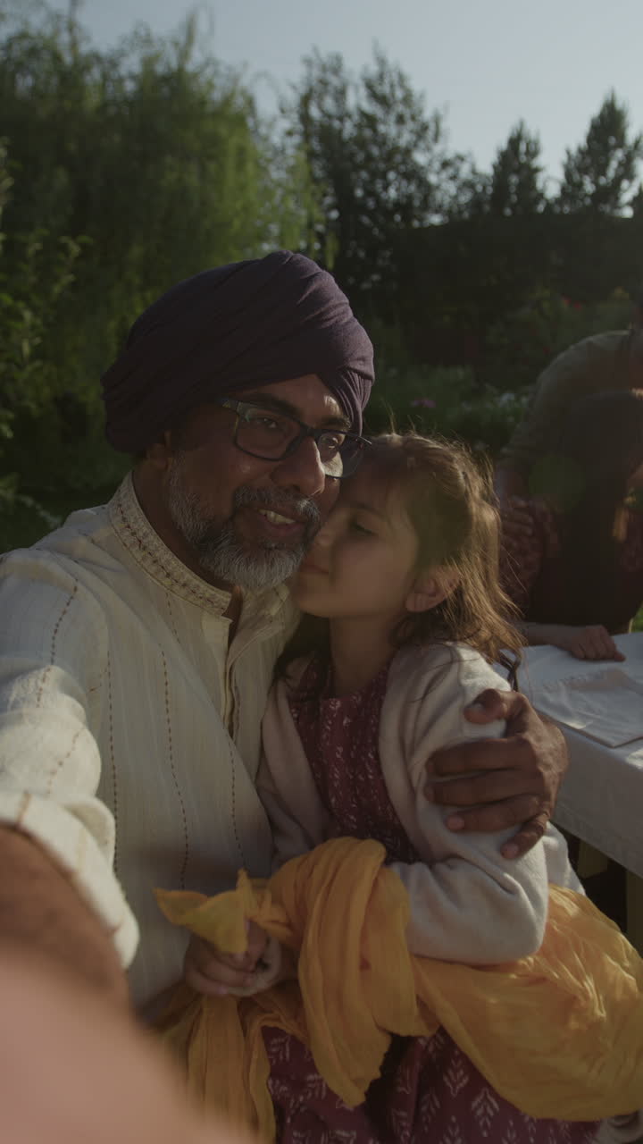 Heartwarming Family Selfie at Outdoor Gathering