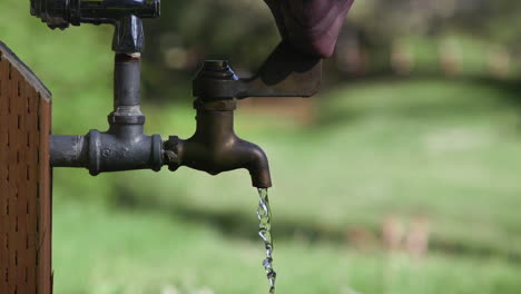 Outdoor-water-spigot-at-park.-Close-up-2.-10sec-60fps