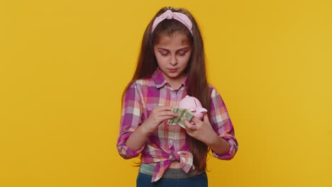 Poor-child-girl-kid-holding-piggybank-and-one-dollar-banknote,-financial-crisis,-bankruptcy,-poverty