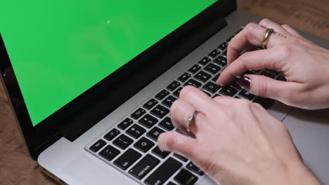 woman hands typing on laptop