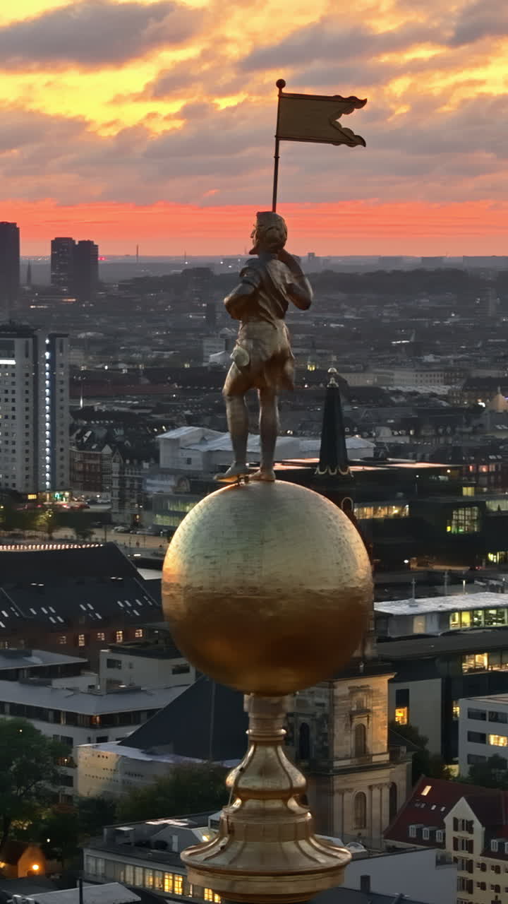 Aerial drone view of the top of the Church of Our Saviour in the city centre of Copenhagen, Denmark at sunset. Vertical