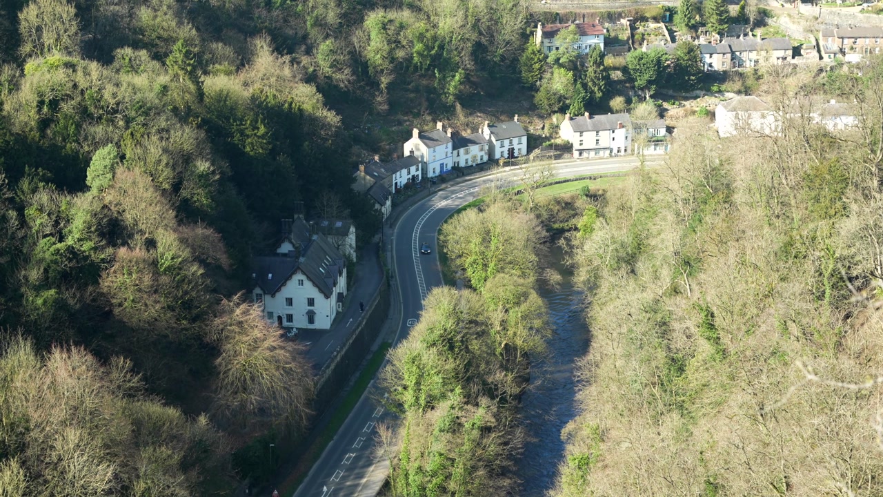 View of countryside road into Matlock town, charming Peak District countryside