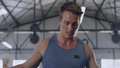 sporty young man skipping rope during his exercise