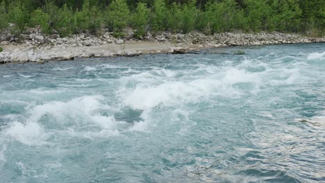 beautiful view of mountain river fast flowing water and rocks, wild nature