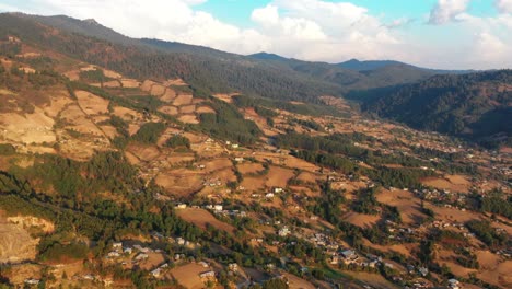 Drone-Aerial-Footage-of-mountains-of-El-Rosario,-Michoacan,-Mexico-during-sunset