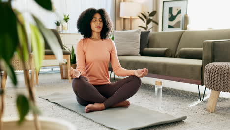 woman practicing yoga at home