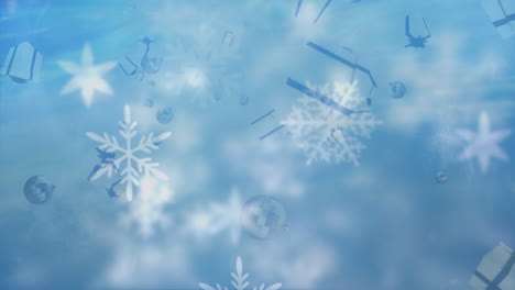 copos de nieve y regalos de navidad moviéndose contra un fondo azul