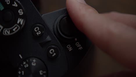 Close-up-static-shot-of-finger-turning-off-camera