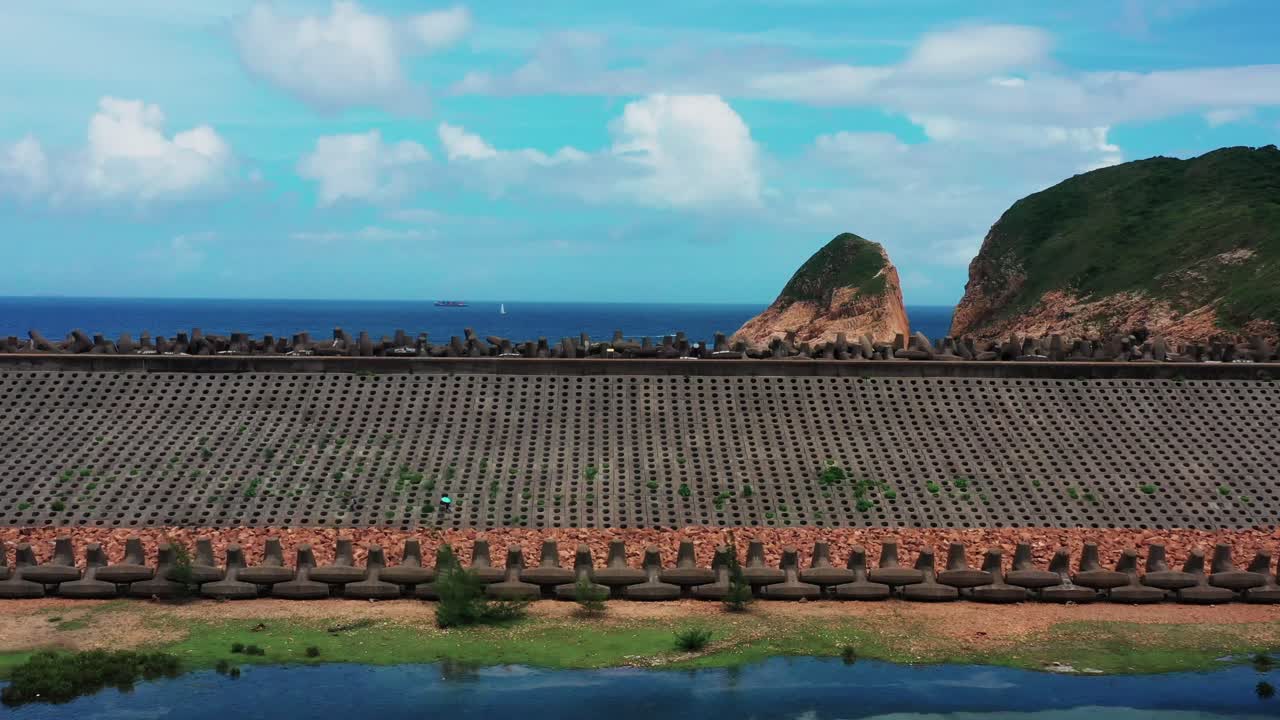 сай-кун гонконг прибрежные блоки долос морская дамба бетонное водохранилище барьер воздушная тележка левый