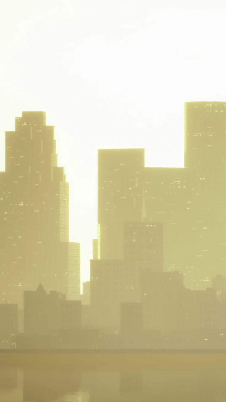 Horizonte urbano al atardecer con edificios altos y luz tenue.