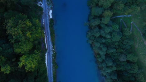 Aerial-View-Of-Klammsee-Lake-Surrounded-With-Green-Forest-In-Austria