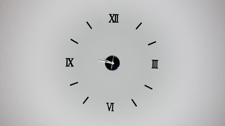 Clock on white background and movement of clock hands. Time lapse clock with three arrow hands moving fast