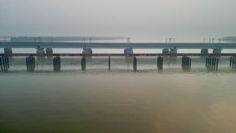 bhayandar to naigaon vasai creek railway bridge side empty drone shot .